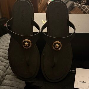 Versace Black Thong Sandals with Gold Medusa Emblem